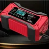 A red and black car battery charger with a digital display. Produktbild-Vorschau