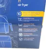 A close-up view of the side of an air fryer box, showcasing its features and specifications. Produktbild-Vorschau
