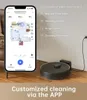 A smartphone displaying a robot vacuum app interface is placed next to a robot vacuum cleaner charging on a wooden floor. Náhled obrázku produktu