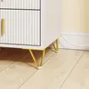 Nahaufnahme der goldenen Vierbein-Füße des SoBuy Nachttisches FBT115-L-E-W auf Holzboden Produktbild-Vorschau