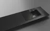 A black kitchen sink with a faucet and a drain board is installed on a black countertop. Anteprima dell’immagine prodotto
