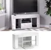 A white high-gloss TV stand with a television on top, set in a room with a patterned rug and a plant. Náhled obrázku produktu