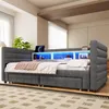 A modern bedroom with a gray upholstered bed featuring integrated LED lighting and storage. Podgląd zdjęcia produktu