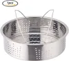 A stainless steel steamer basket with handles, shown from a slightly elevated angle against a white background. Produktbild-Vorschau