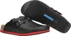 A pair of black clogs with red trim and cork soles are shown against a white background. One clog is shown from the side, and the other is shown from underneath. Náhled obrázku produktu