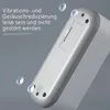 Close-up of the base of a white electronic device, possibly a cleaner, showing vibration dampening features. Produktbild-Vorschau