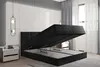 A black upholstered bed with its storage compartment open, in a modern bedroom setting. Voir les images du produit