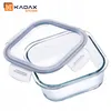A clear studio shot of a glass food storage container with its lid slightly ajar. Produktbild-Vorschau