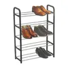 A four-tier shoe rack filled with various men's dress shoes and boots. Produktbild-Vorschau