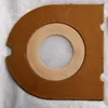 A close-up view of a vacuum cleaner bag and filters. Produktbild-Vorschau