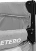 A close-up view of the corner of a grey travel cot, showing the fabric and a black plastic connector. Anteprima dell’immagine prodotto