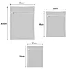 Three laundry bags of different sizes are shown with dimensions indicated. Voir les images du produit