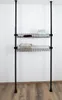 A black metal shelving unit with two wire baskets, one holding a small box and the other a light-colored rectangular object. Náhled obrázku produktu
