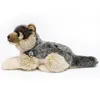 A plush toy wolf lying down on a white background. Produktbild-Vorschau