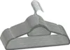 A stack of gray velvet hangers with metal hooks, isolated on a white background. Náhľad obrázku produktu