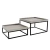 Two modern coffee tables with black metal frames and light gray tops are shown against a white background. Produktbild-Vorschau