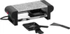 A raclette grill with a stone top and accessories, shown on a white background. Podgląd zdjęcia produktu
