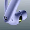 Close-up of a purple earbud with a green light. Produktbild-Vorschau