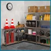 A storage room with shelves filled with various items like tires, containers, and safety equipment. Podgląd zdjęcia produktu