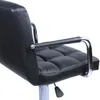 A close-up view of the armrest and seat of a black bar stool. Náhled obrázku produktu