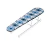 A tabletop ironing board with a patterned cover. Produktbild-Vorschau
