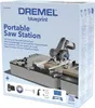 The image shows the retail packaging for a Dremel portable saw station. Produktbild-Vorschau