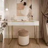 A modern vanity table with a stool in a well-lit room. Produktbild-Vorschau