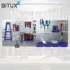 A tool wall organizer with various tools neatly arranged on it, displayed in a workshop setting. Produktbild-Vorschau