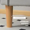 Close-up of a wooden leg of a sofa, with text overlays highlighting product features. Náhled obrázku produktu