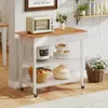 A kitchen cart with various kitchen items on it, set against a white paneled wall and wooden floor. Náhled obrázku produktu