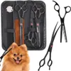 A grooming kit for pets, including scissors and combs, is displayed alongside a Pomeranian dog. Náhľad obrázku produktu