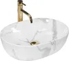 A white marble-patterned sink with a gold faucet against a white background. Náhled obrázku produktu
