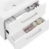 A close-up view of a white bathroom vanity with drawers open, showing organized towels and toiletries. Produktbild-Vorschau