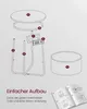An exploded diagram showing the assembly of a side table with integrated power outlets and USB ports, along with a separate cylindrical component and an open instruction manual. Produktbild-Vorschau