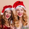 Huuraa Weihnachtsmütze Hantel Silhouette Geschenk Rot/Weiß Produktbild-Vorschau 2