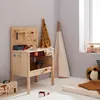 A child's playroom with a wooden workbench, a teepee, and stuffed toys. Produktbild-Vorschau