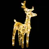 A lit-up reindeer decoration against a black background. Podgląd zdjęcia produktu