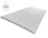 A white, textured panel with parallel ridges, presented at an angle on a white background. A logo and text are visible in the top-left corner. Anteprima dell’immagine prodotto