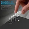 A hand is shown applying a camera lens protector to a smartphone. Produktbild-Vorschau