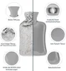 A split image showing a grey hot water bottle. The left side shows the fuzzy cover and details like the opening and the cover material. The right side shows the rubber bottle itself with details like the screw cap, texture, and material. Anteprima dell’immagine prodotto