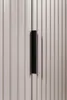 A close-up shot of a cabinet door with a black handle. Produktbild-Vorschau