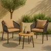 Two chairs and a small table are set up on an outdoor patio. Podgląd zdjęcia produktu
