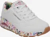 A white SKECHERS sneaker with colorful graffiti-style artwork on the sole and interior lining. Náhled obrázku produktu