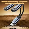 A close-up marketing image of a USB-C splitter adapter with charging and headphone ports, set against a desert-like background. Produktbild-Vorschau