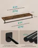 A diagram showing a wall-mounted shelf with a clothes rail, including dimensions and weight capacities. Produktbild-Vorschau