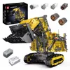A large, yellow construction excavator toy set with its packaging and components displayed. Anteprima dell’immagine prodotto
