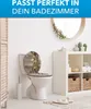 A bathroom scene featuring a toilet with a decorative lid, a shelving unit with storage baskets and toiletries, and a wooden folding screen. Produktbild-Vorschau