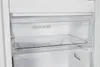 Interior view of a refrigerator or freezer with clear drawers. Produktbild-Vorschau