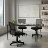 An office setting with a desk, chairs, and a whiteboard. Produktbild-Vorschau