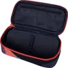 An open pencil case with a patterned exterior and a dark blue interior. Podgląd zdjęcia produktu